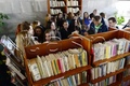 Školáci počas návštevy novej pobočky knižnice, ktorú otvorili v priestoroch stanice ŽSR v Prešove (foto: TASR)